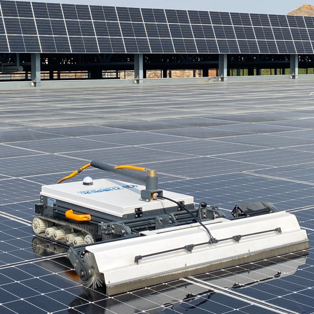 Photovoltaic cleaning robot at work