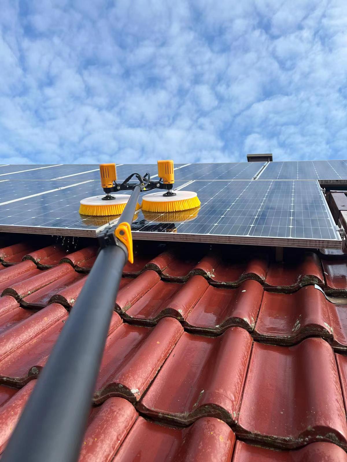 Brush clean solar roof panel